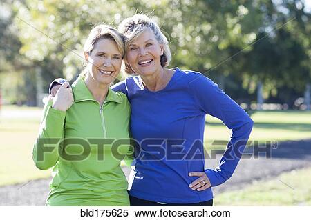Stock Photography - Caucasian women smiling in park. Fotosearch