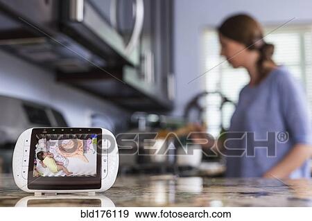 Close up of baby monitor in kitchen View Large Photo Image Stock Photo - Close up of baby monitor in kitchen. Fotosearch