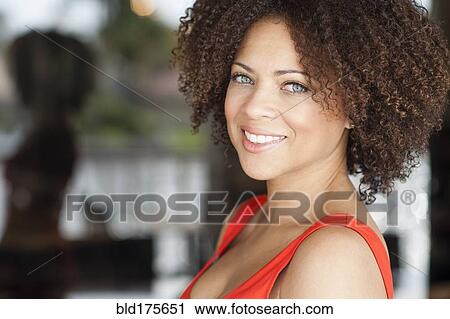 Close up of mixed race woman smiling View Large Photo Image Stock Image - Close up of mixed race woman smiling. Fotosearch