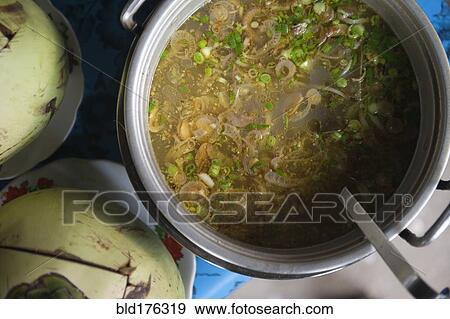 Stock Photo - Close up of pot of hearty soup. Fotosearch