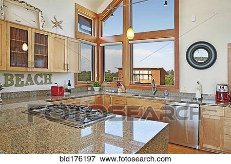 Stock Photo - Countertops and windows in modern kitchen. Fotosearch