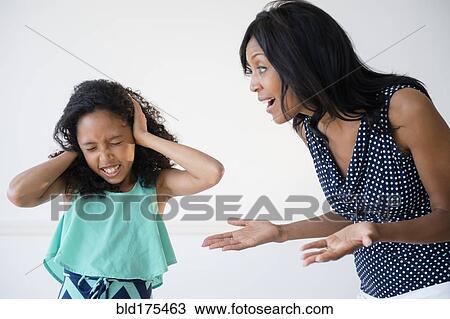 Daughter ignoring yelling mother View Large Photo Image Stock Image - Daughter ignoring yelling mother. Fotosearch
