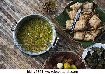 Fruit, soup, grilled food and spices on woven mat View Large Photo Image Stock Image - Fruit, soup, grilled food and spices on woven mat. Fotosearch