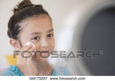 Stock Photo - Girl washing her face. Fotosearch