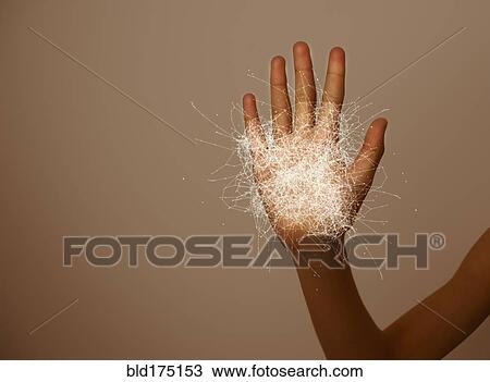 Stock Image - Hand of mixed race girl with graphic pattern. Fotosearch