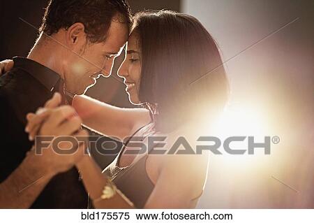 Stock Photography - Hispanic couple dancing. Fotosearch