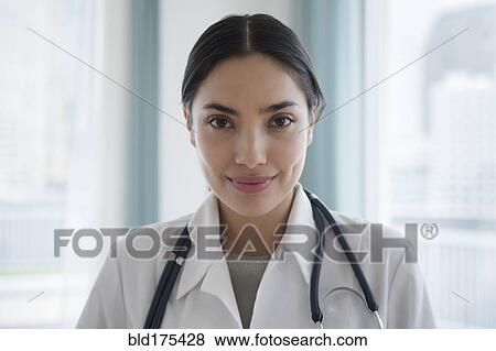 Stock Photo - Hispanic doctor smiling. Fotosearch
