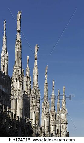 Low angle view of church spires, Milano, Lombardia, Italy View Large Photo Image Stock Photo - Low angle view of church spires, Milano, Lombardia, Italy. Fotosearch