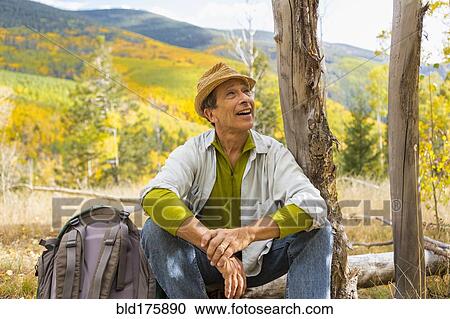Man admiring autumn forest View Large Photo Image Stock Image - Man admiring autumn forest. Fotosearch