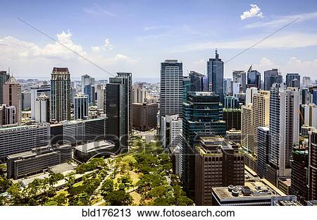 Manila cityscape under blue sky, Philippines View Large Photo Image Stock Image - Manila cityscape under blue sky, Philippines. Fotosearch