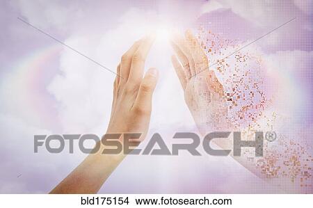 Picture - Pixelated hand of mixed race girl in sky. Fotosearch