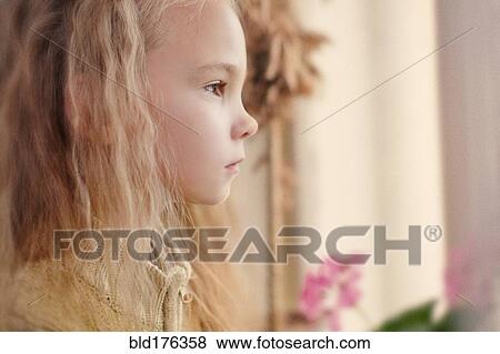 Profile of serious Caucasian girl View Large Photo Image Stock Photo - Profile of serious Caucasian girl. Fotosearch