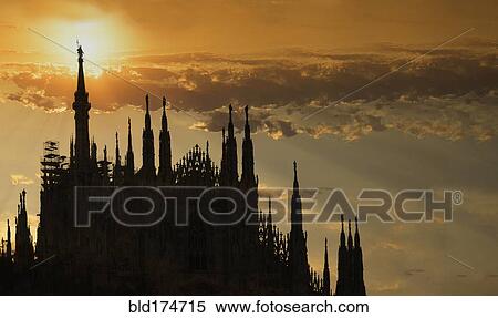 Stock Photography - Silhouette of church under sunset sky. Fotosearch