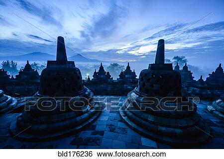 Silhouette of monuments in Borobudur, Jawa Tengah, Indonesia View Large Photo Image Stock Photograph - Silhouette of monuments in Borobudur, Jawa Tengah, Indonesia. Fotosearch