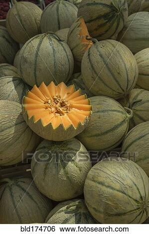 Stock Photograph - Sliced cantaloupe in pile. Fotosearch