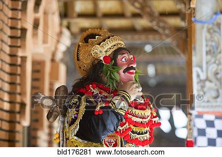Traditional dancer standing in Buddhist temple, Kintamani, Bali, Indonesia View Large Photo Image Stock Image - Traditional dancer standing in Buddhist temple, Kintamani, Bali, Indonesia. Fotosearch