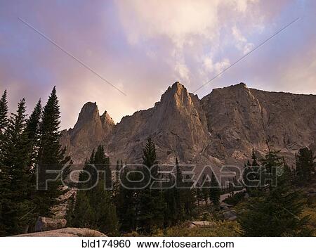 Stock Image - Wind River Mountains under clouds, Pinedale, Wyoming, United States. Fotosearch