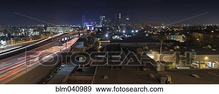 Stock Photo - Aerial view of traffic on highway in Los Angeles cityscape, California, United States. Fotosearch