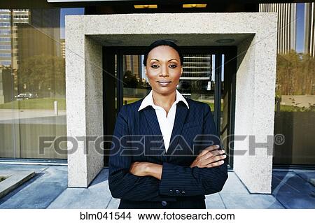 Black businesswoman standing outdoors View Large Photo Image Picture - Black businesswoman standing outdoors. Fotosearch