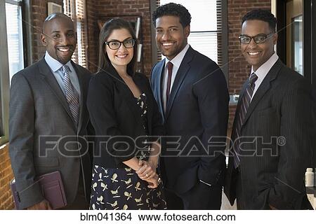 Picture - Business people smiling in office. Fotosearch