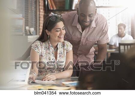 Business people talking in office View Large Photo Image Picture - Business people talking in office. Fotosearch