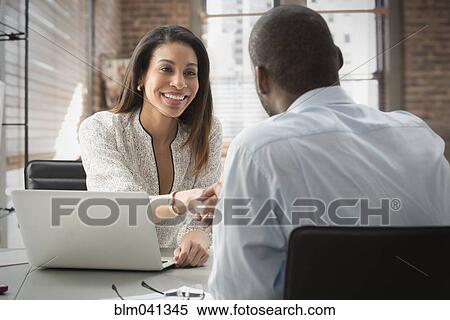 Business people talking in office View Large Photo Image Stock Photography - Business people talking in office. Fotosearch