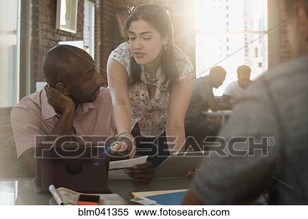 Business people talking in office View Large Photo Image Stock Photography - Business people talking in office. Fotosearch