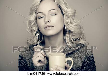 Caucasian woman drinking coffee View Large Photo Image Stock Photograph - Caucasian woman drinking coffee. Fotosearch