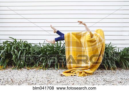 Caucasian woman in blanket falling outdoors View Large Photo Image Stock Photo - Caucasian woman in blanket falling outdoors. Fotosearch