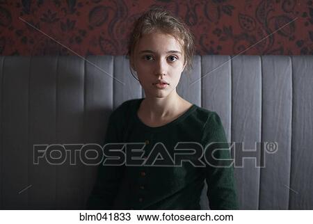 Caucasian woman sitting on bench View Large Photo Image Stock Image - Caucasian woman sitting on bench. Fotosearch