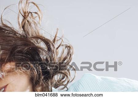 Caucasian woman tossing her hair View Large Photo Image Stock Photo - Caucasian woman tossing her hair. Fotosearch