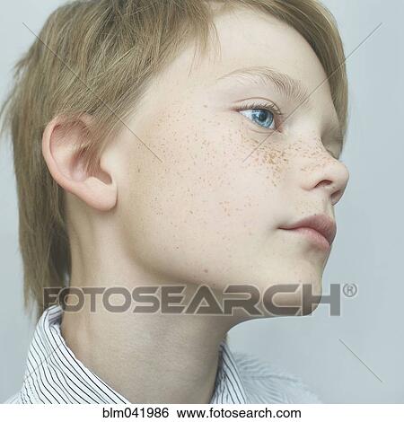 Close up of Caucasian boy with freckles View Large Photo Image Stock Photograph - Close up of Caucasian boy with freckles. Fotosearch
