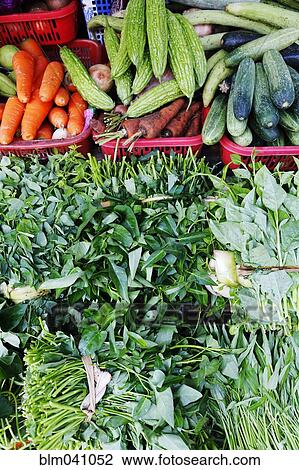 Stock Image - Full frame view of fresh produce for sale at market. Fotosearch