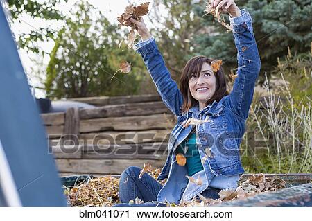 Hispanic woman playing in truck bed View Large Photo Image Stock Image - Hispanic woman playing in truck bed. Fotosearch
