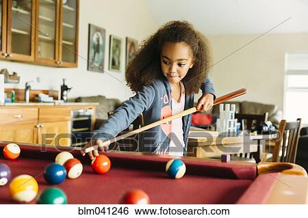 Mixed race girl playing pool View Large Photo Image Stock Photograph - Mixed race girl playing pool. Fotosearch