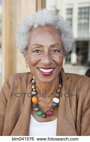 Older African American woman smiling View Large Photo Image Stock Photograph - Older African American woman smiling. Fotosearch
