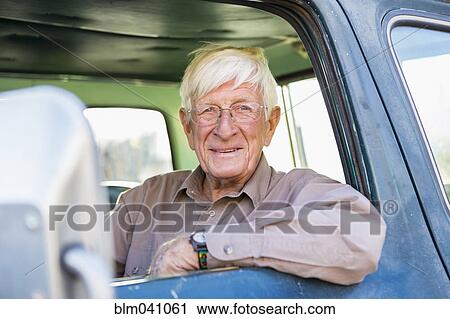 Older Caucasian man sitting in truck View Large Photo Image Stock Image - Older Caucasian man sitting in truck. Fotosearch