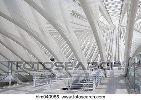 Stock Photography - Pillars and staircase in modern train station. Fotosearch