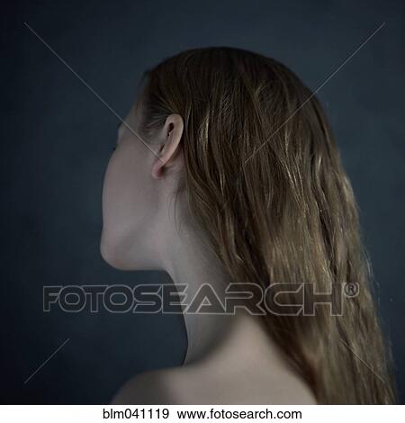 Stock Photo - Rear view of Caucasian teenage girl with long hair. Fotosearch