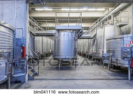 Stock Photograph - Vats in wine processing plant. Fotosearch