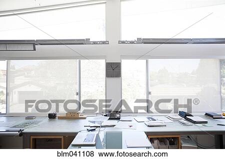 Windows and desks in modern office View Large Photo Image Stock Photo - Windows and desks in modern office. Fotosearch