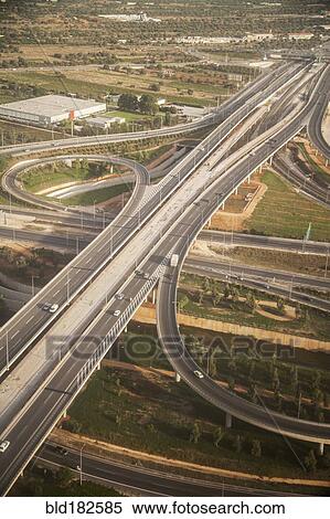 Stock Photography - Aerial view of freeway roads in rural landscape. Fotosearch