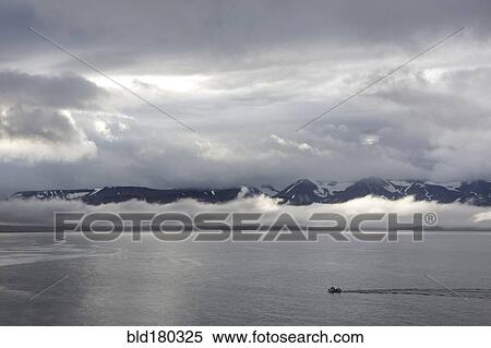 Aerial view of seascape and remote mountains View Large Photo Image Stock Photography - Aerial view of seascape and remote mountains. Fotosearch