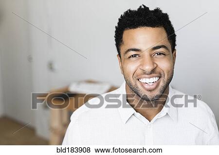 African American businessman smiling View Large Photo Image Stock Photo - African American businessman smiling. Fotosearch