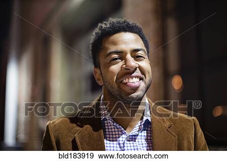 African American businessman smiling outdoors View Large Photo Image Stock Photo - African American businessman smiling outdoors. Fotosearch