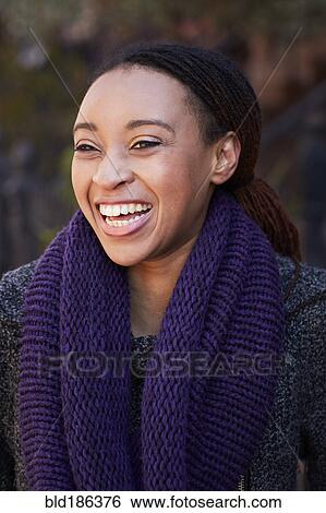 African American woman laughing outdoors View Large Photo Image Stock Photograph - African American woman laughing outdoors. Fotosearch