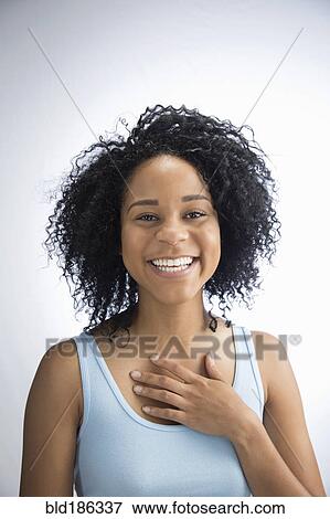 Stock Photo - African American woman smiling. Fotosearch