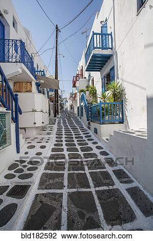 Stock Image - Alleyway and traditional buildings. Fotosearch