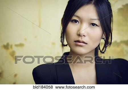 Asian businesswoman with serious expression View Large Photo Image Stock Photo - Asian businesswoman with serious expression. Fotosearch