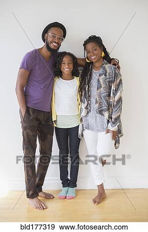 Black family smiling View Large Photo Image Stock Photo - Black family smiling. Fotosearch